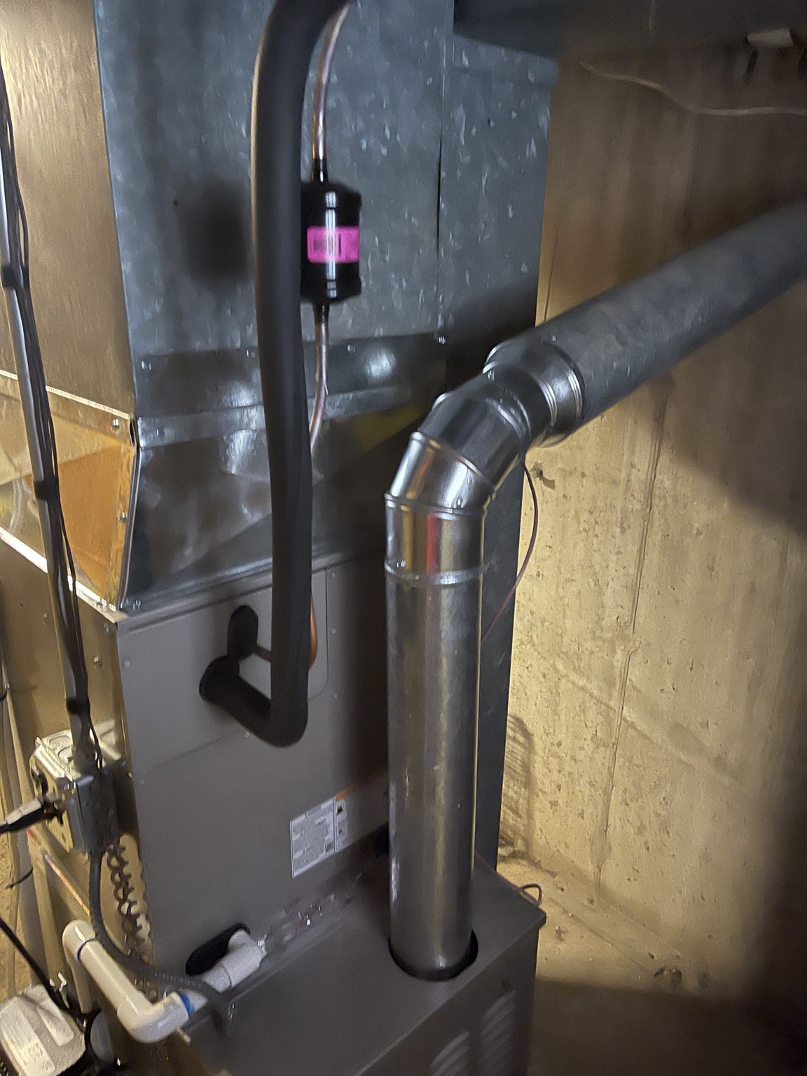Carrier furnace with vent piping and refrigerant lines