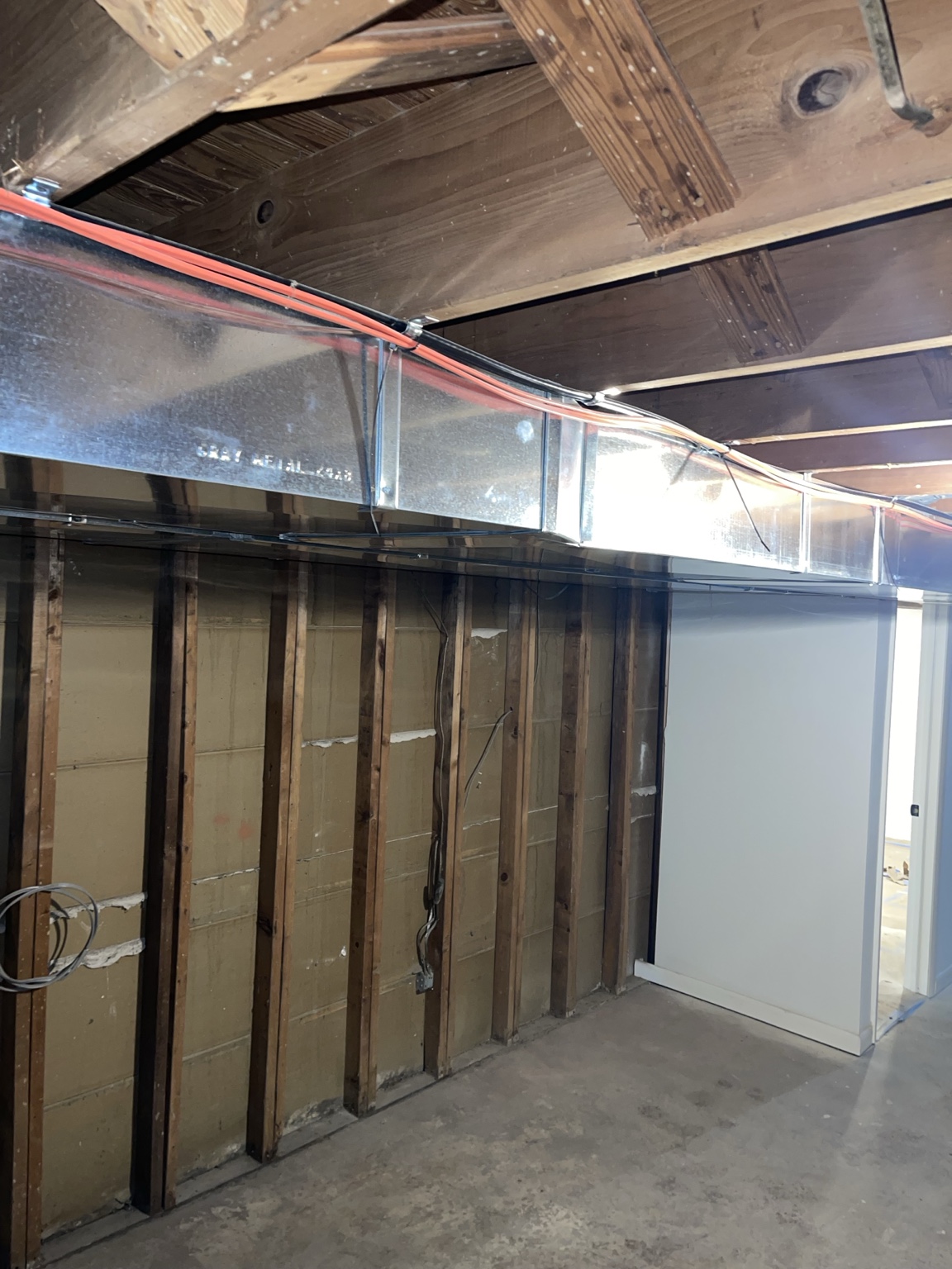 Long basement duct run installation