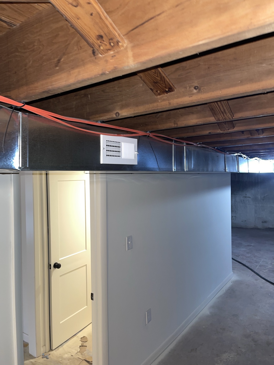 Finished duct run above hallway area