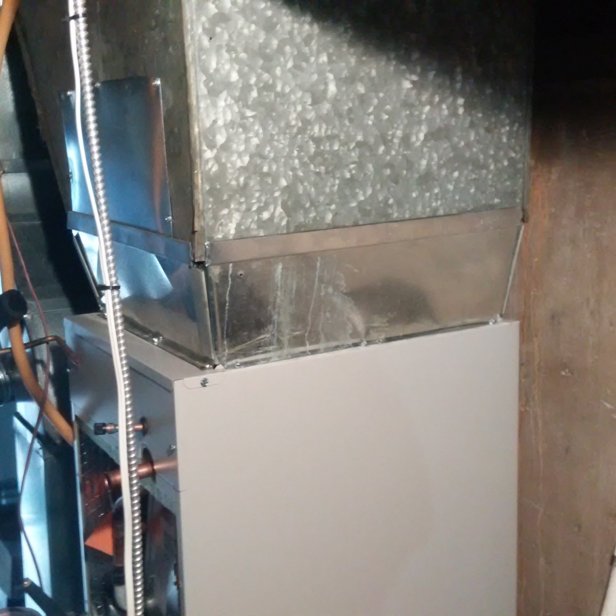 Clean plumbing connections under sink