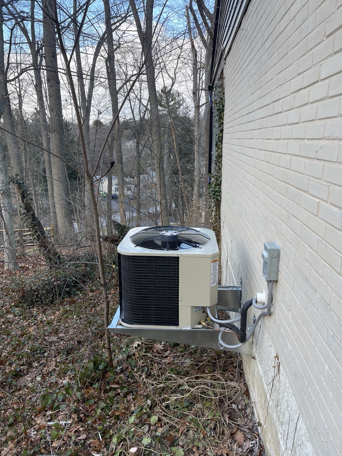 Side view of wall mounted condensing unit